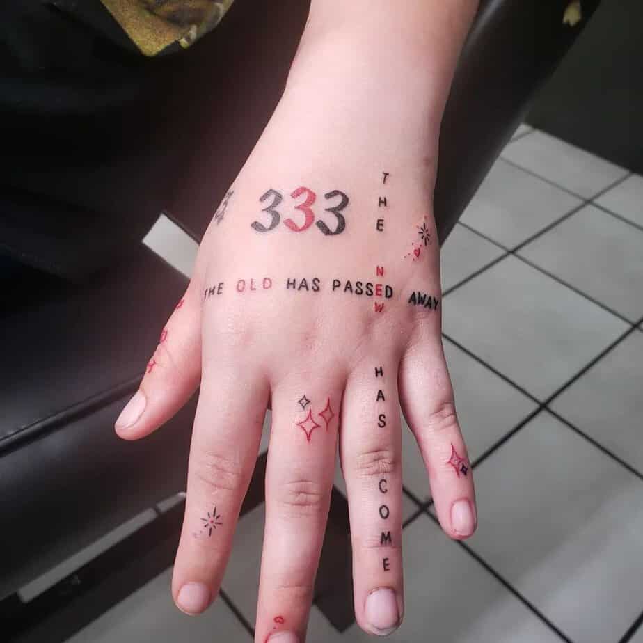 20. 333 tattoo with an inspirational quote