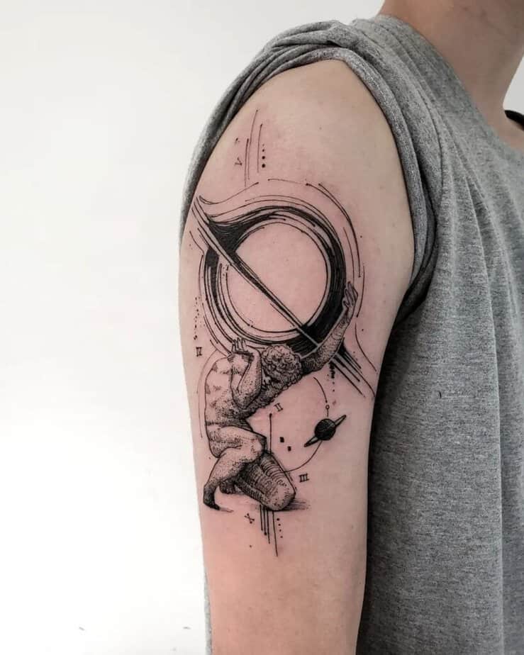 6. Un tatuaggio astratto dell'Atlante sulla parte superiore del braccio