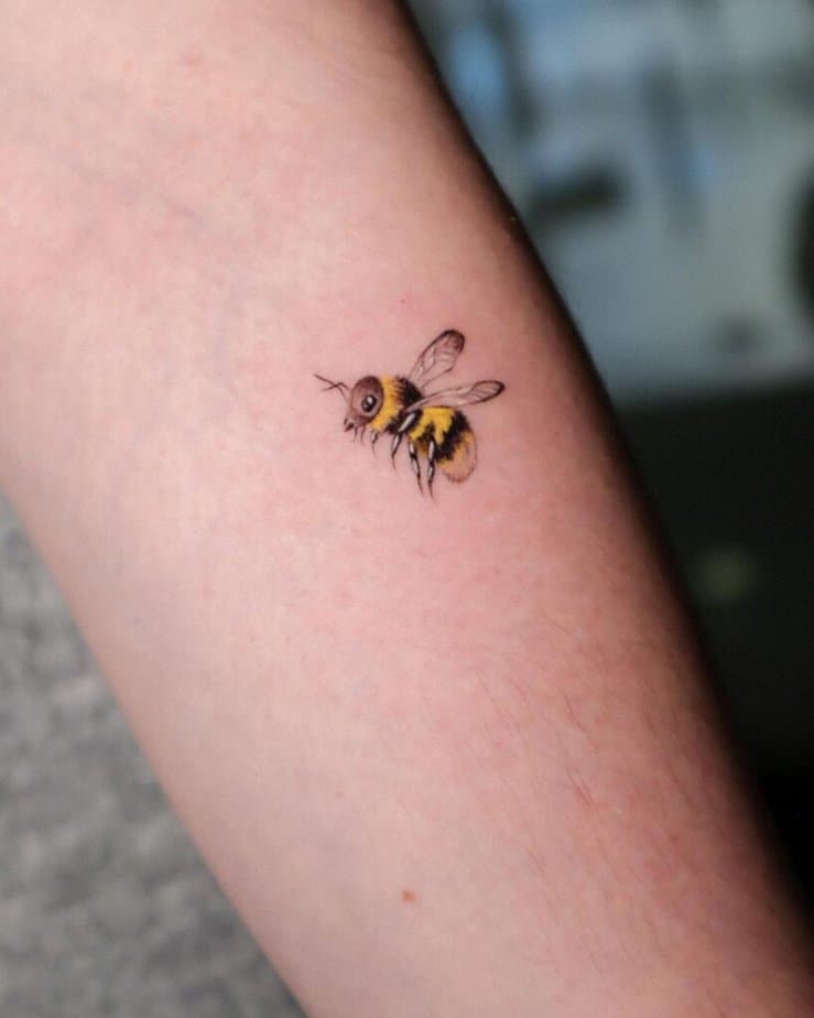 11. A teeny-tiny bee tattoo 