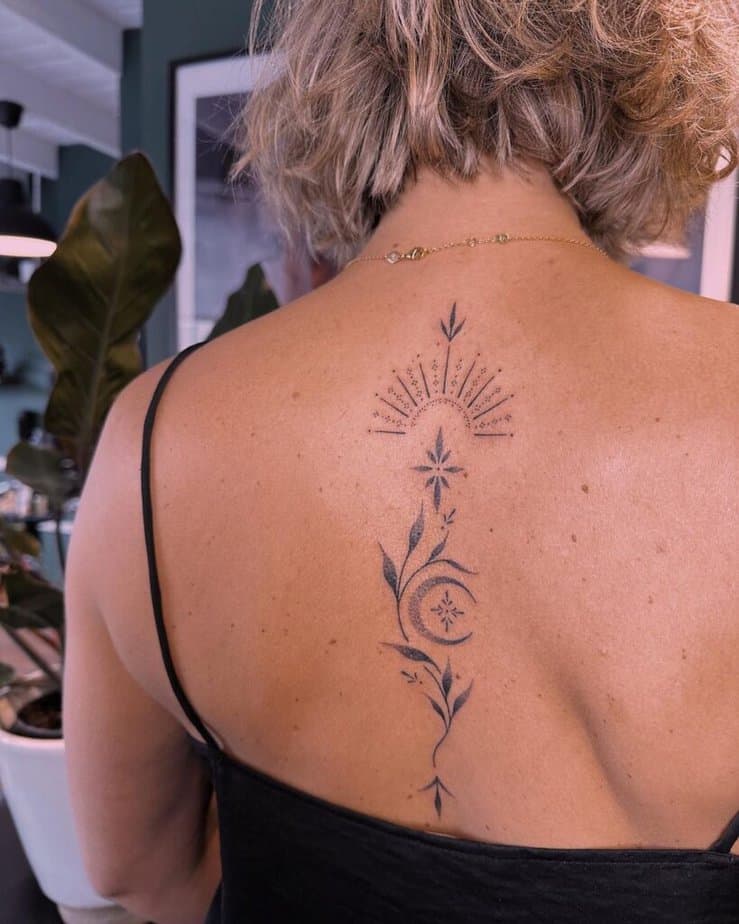 12. A dotwork spine tattoo 