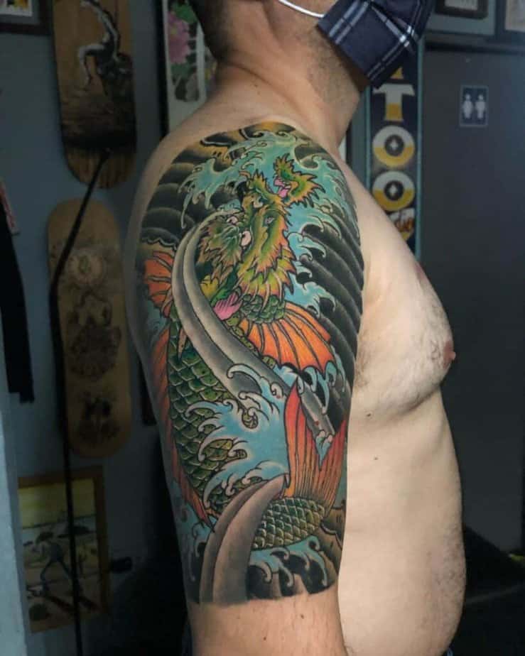 Green dragon koi tattoo