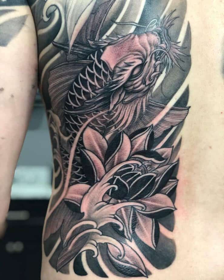 Black and gray dragon koi tattoo