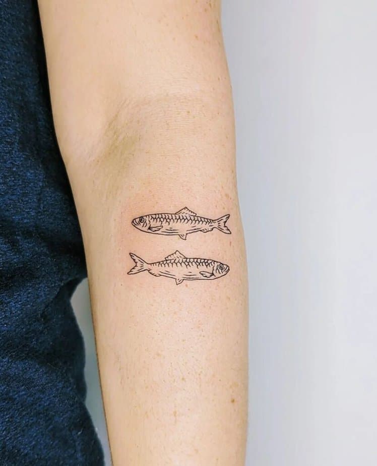 17. A sprat fish tattoo