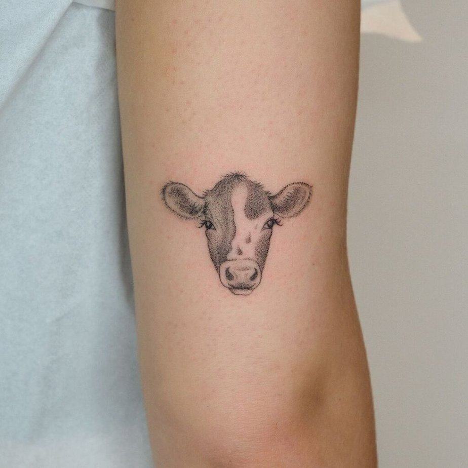 16. A dotwork cow tattoo 