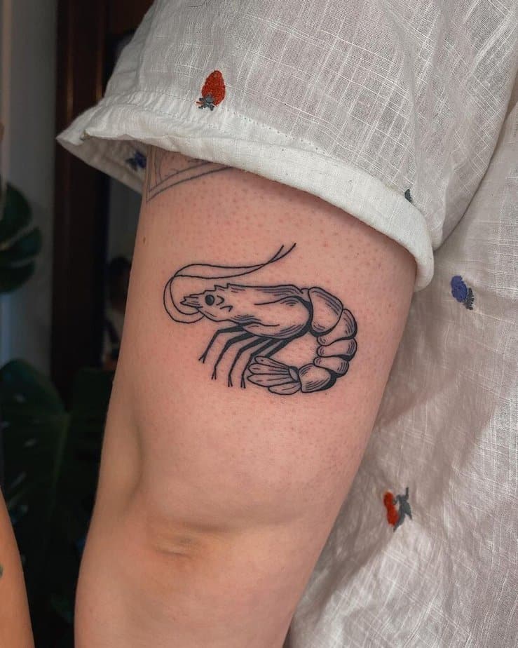 11. A shrimp tattoo on the back of the arm