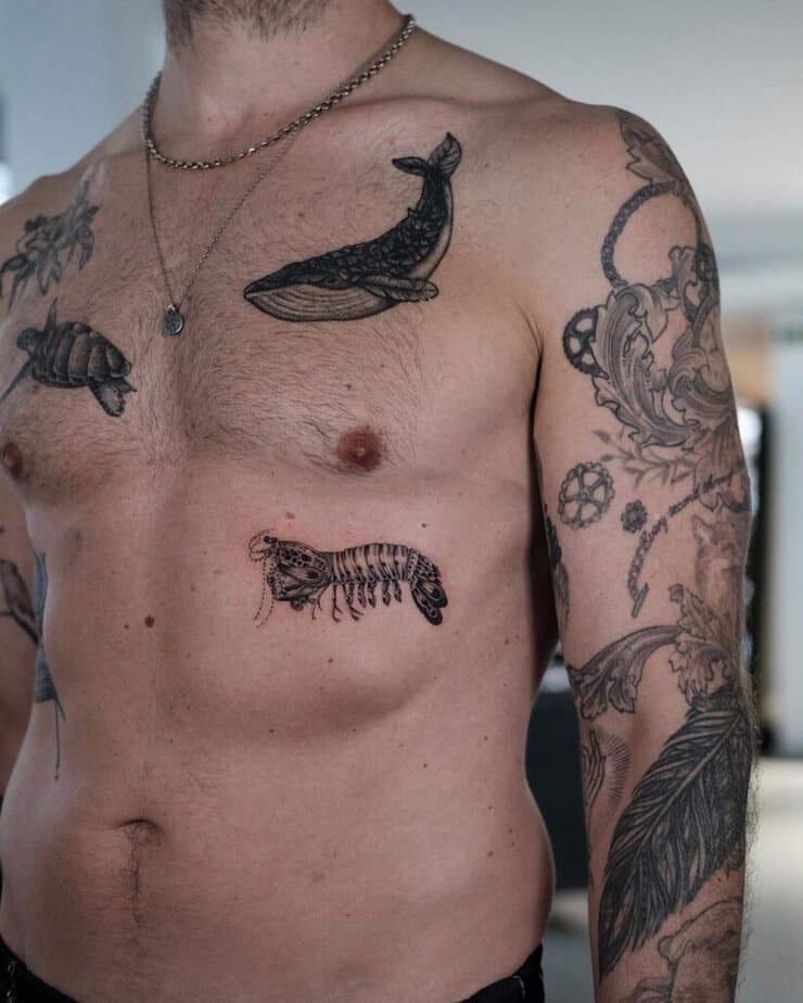 19. A mantis shrimp tattoo on the chest