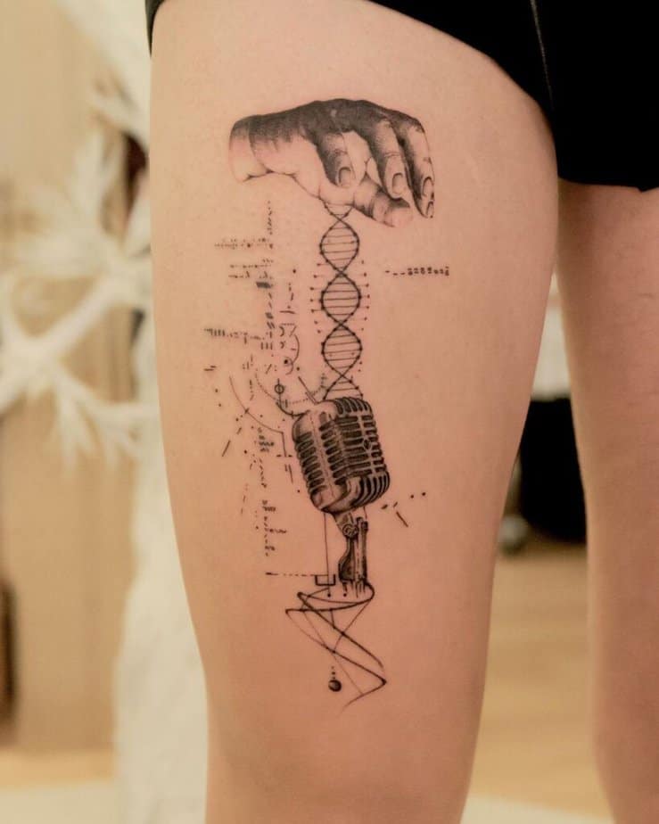 3. A music tattoo on the thigh 