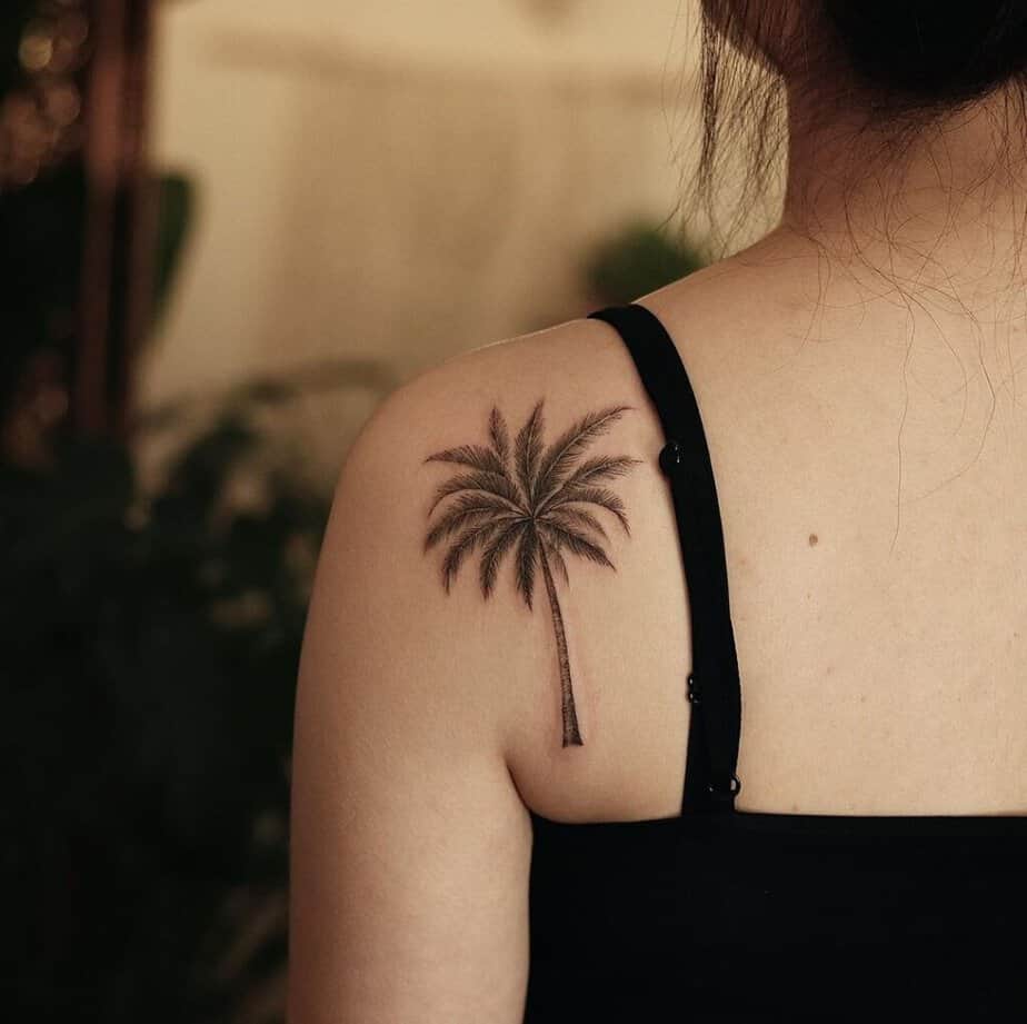 18. A palm tree shoulder tattoo