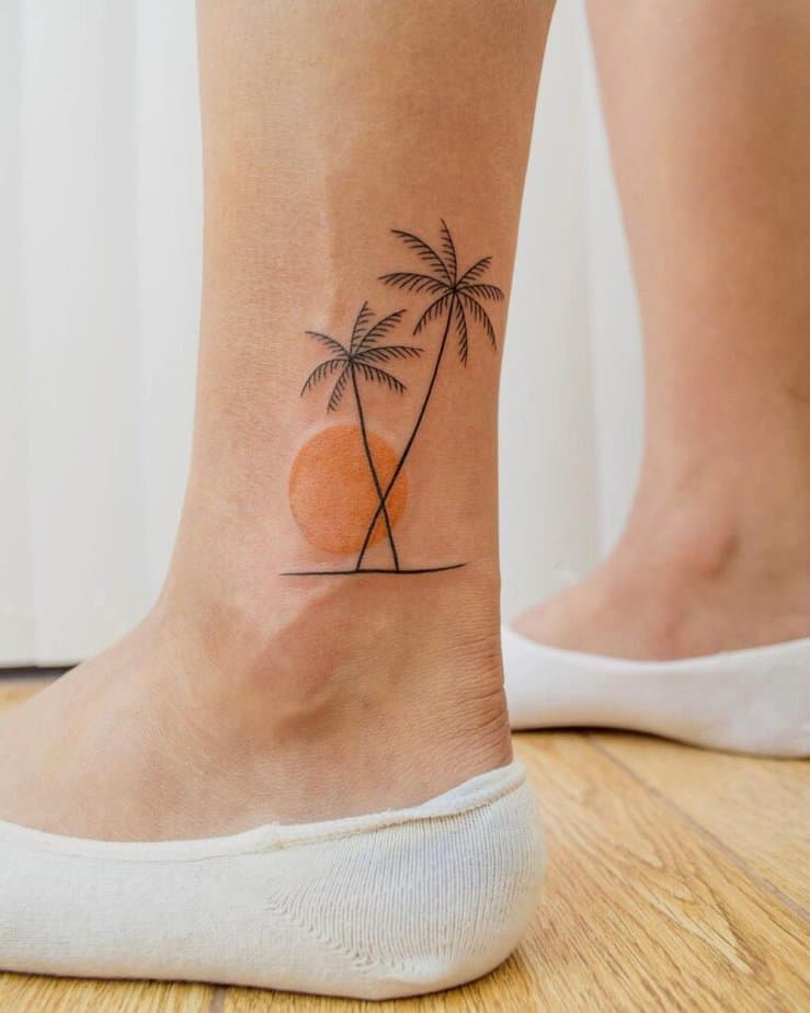 3. A palm tree sunset tattoo 