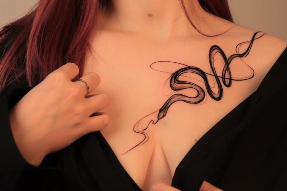 19. A smoke snake tattoo on the chest