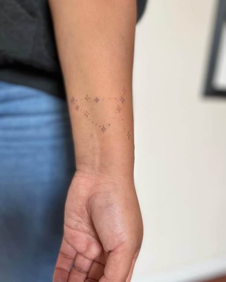 5. A Capricorn constellation tattoo on the wrist