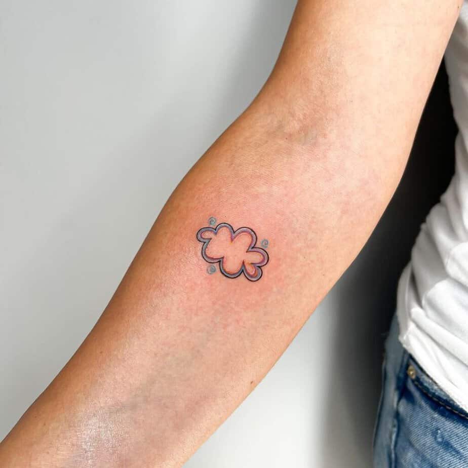 10. Minimalistic cloud tattoo