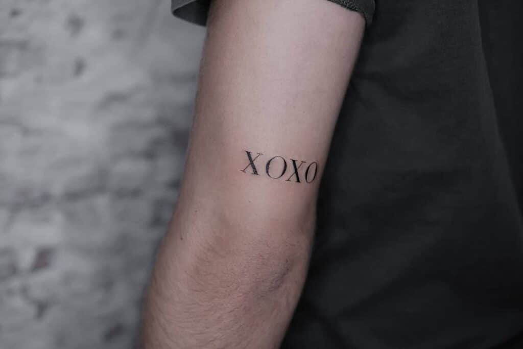 Simple XOXO tattoo