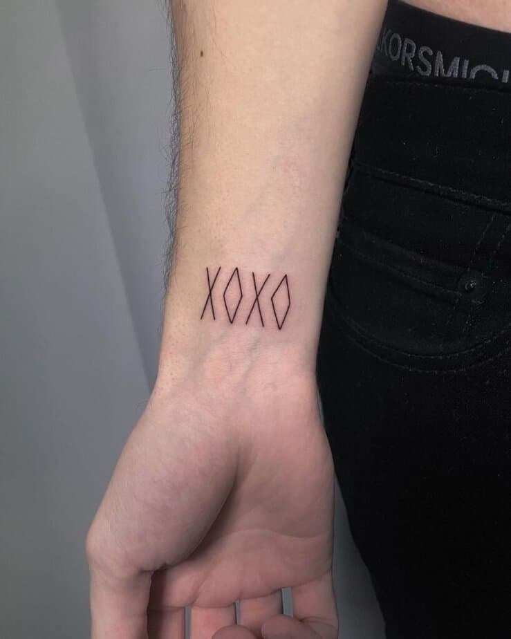 Simple XOXO tattoo