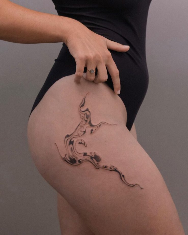 21. An abstract tattoo on the thigh 