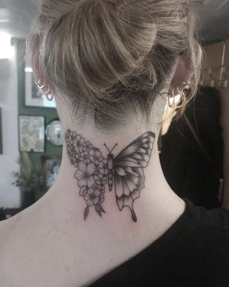 16. Tatuaggio di una farfalla floreale sul collo 