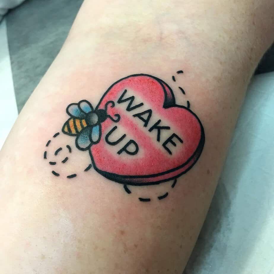15. A “wake up” tattoo
