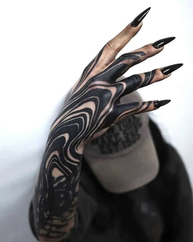15. A finger sleeve tattoo