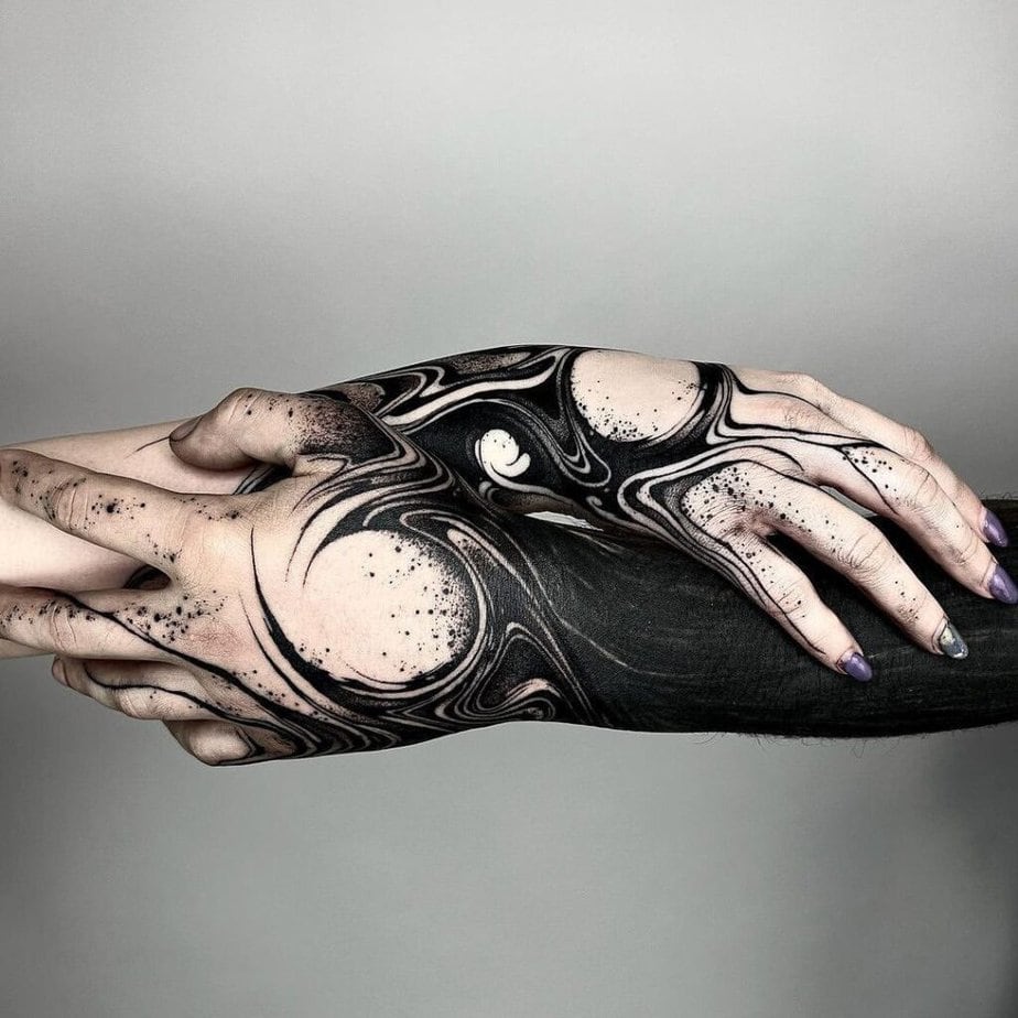 8. A matching black sleeve tattoo 