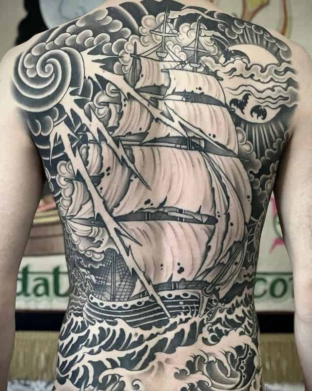 20. Powerful waterscape tattoo