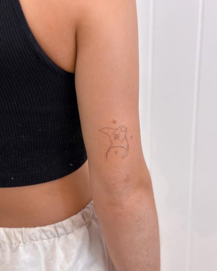 13. A manta ray tattoo 