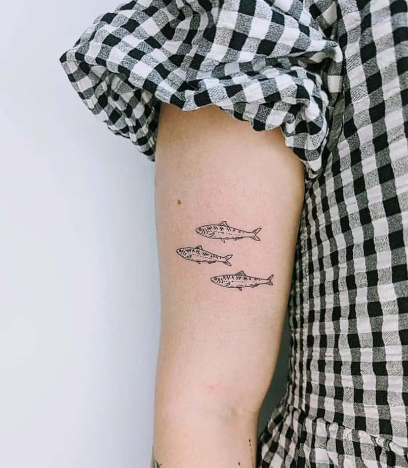 19. A sardine tattoo 