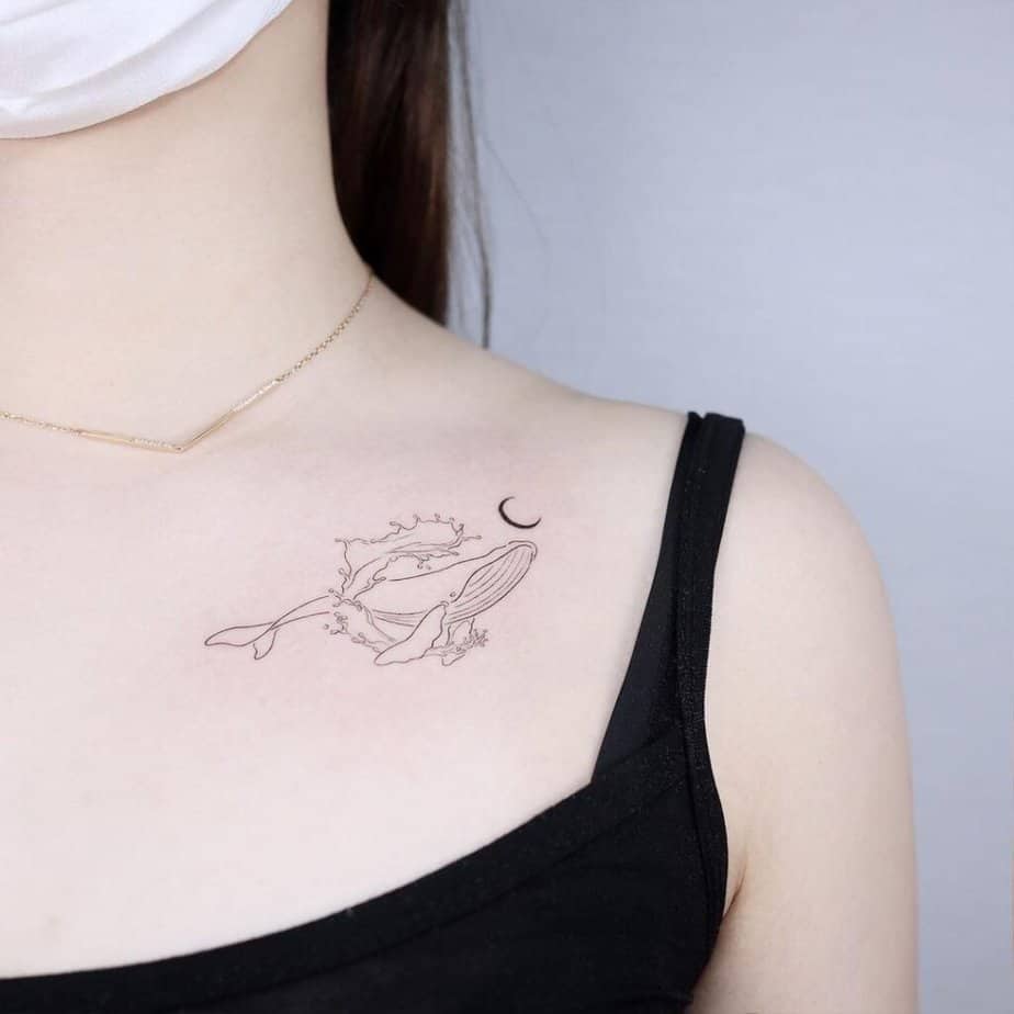 6. A whale tattoo on the collarbone 