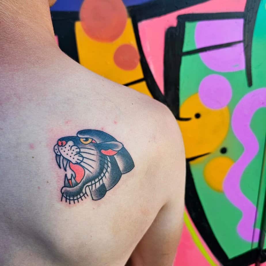 18. A panther tattoo on the shoulder