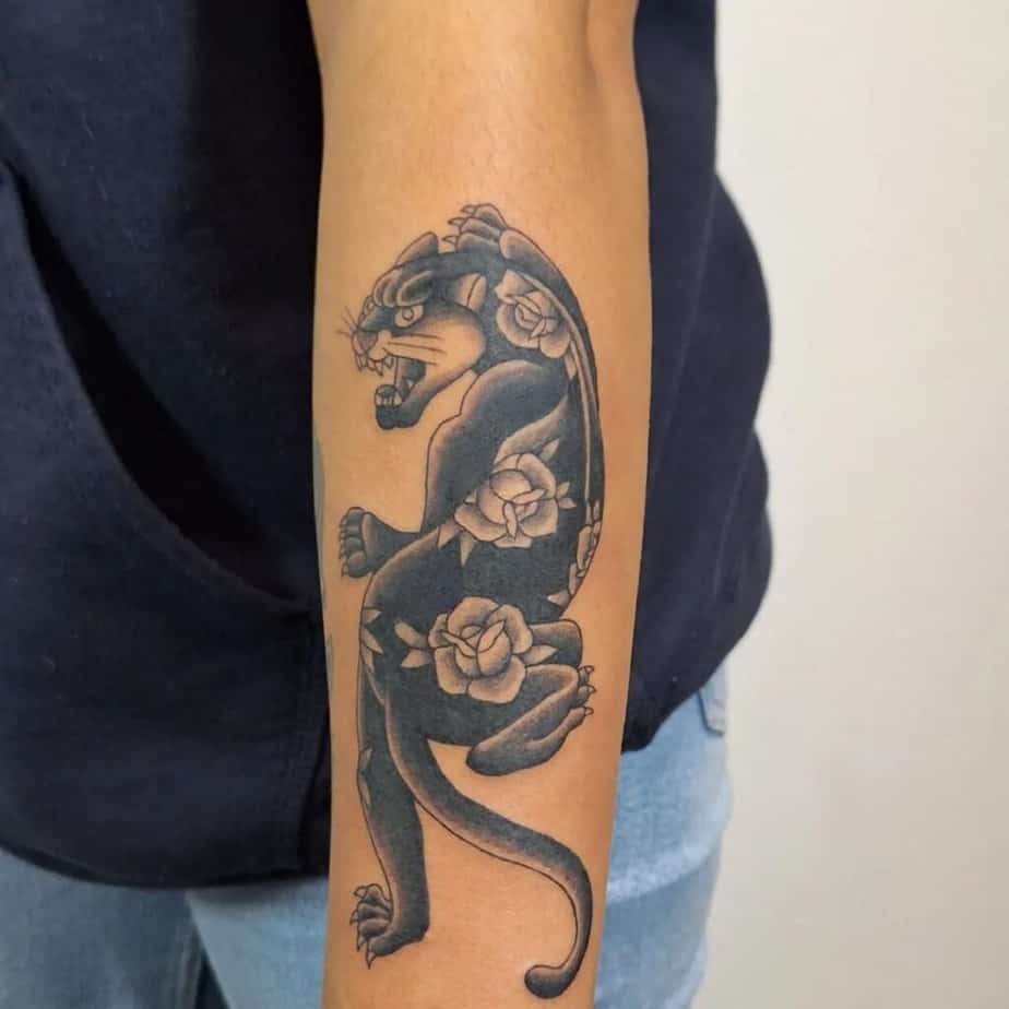21. A black panther with roses 