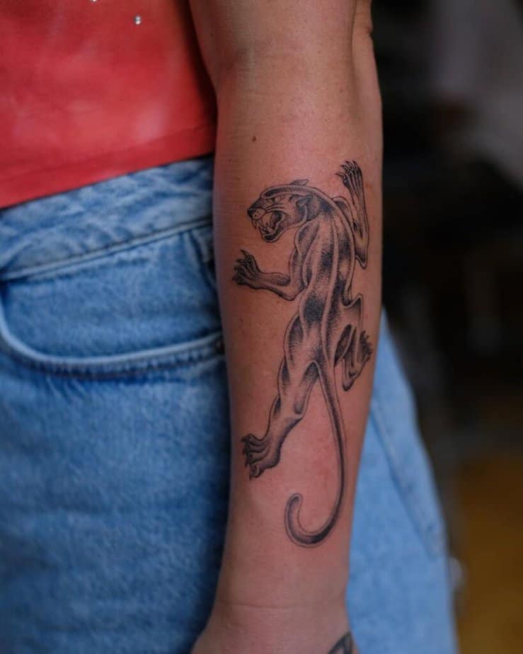 22. A classic panther tattoo 