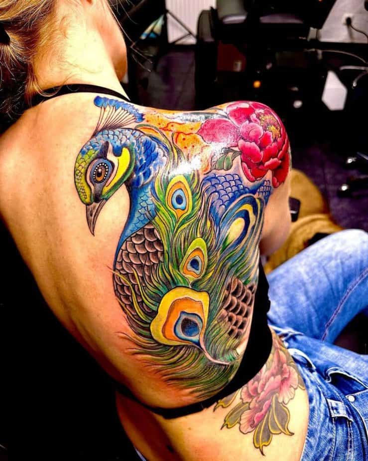 14. A half back peacock tattoo