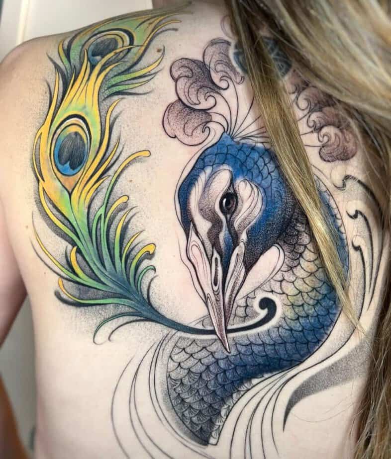 15. A colorful back tattoo