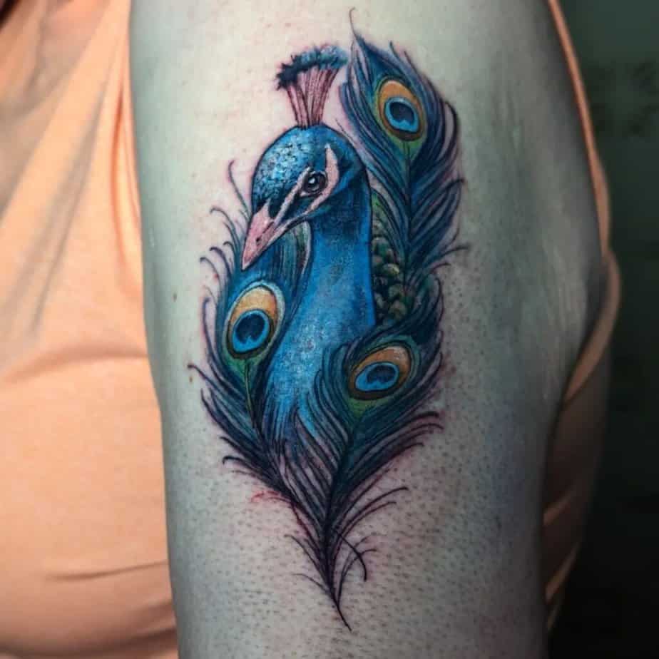 5. A tiny partial sleeve peacock
