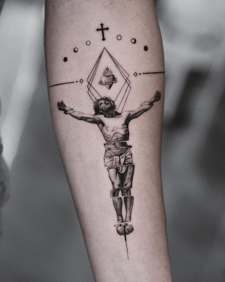 11. A geometry crucifix tattoo