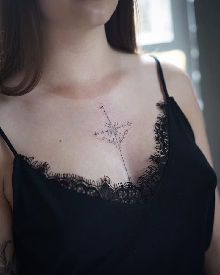 9. A celestial cross tattoo