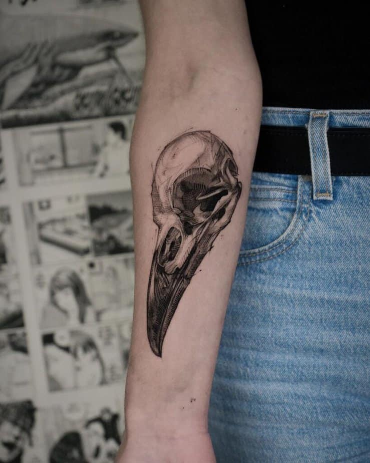 Tatuaggio con teschio di corvo