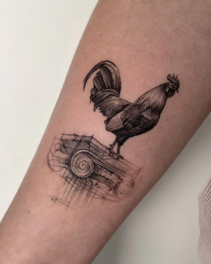 14. A rooster tattoo on the forearm