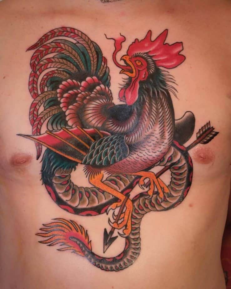 19. A rooster tattoo across the entire chest