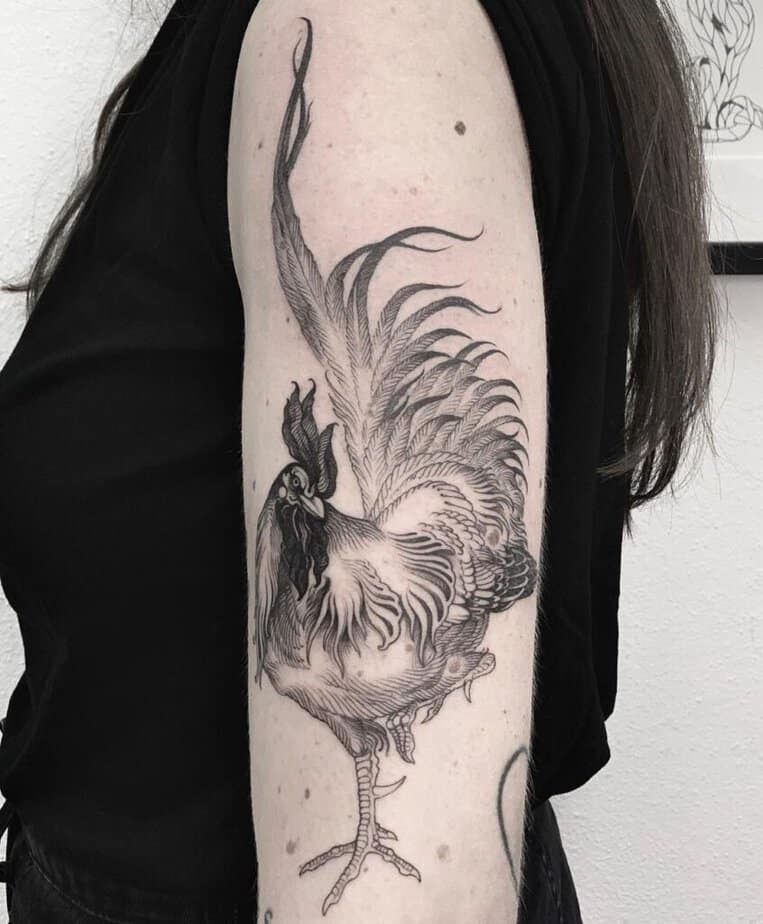 22. A detailed rooster tattoo 