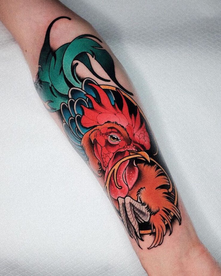 5. A colorful rooster tattoo 