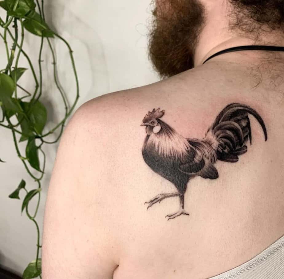 7. A rooster tattoo on the back 