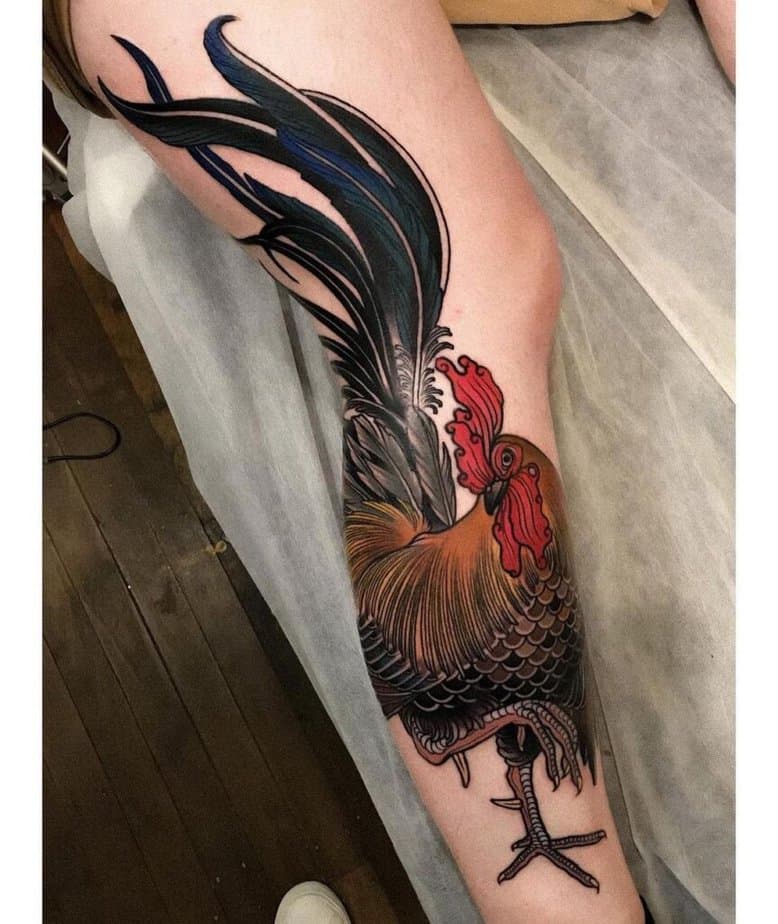 9. A rooster tattoo across the entire leg 
