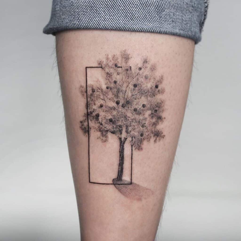 10. Another apple tree tattoo with geometric shapes 