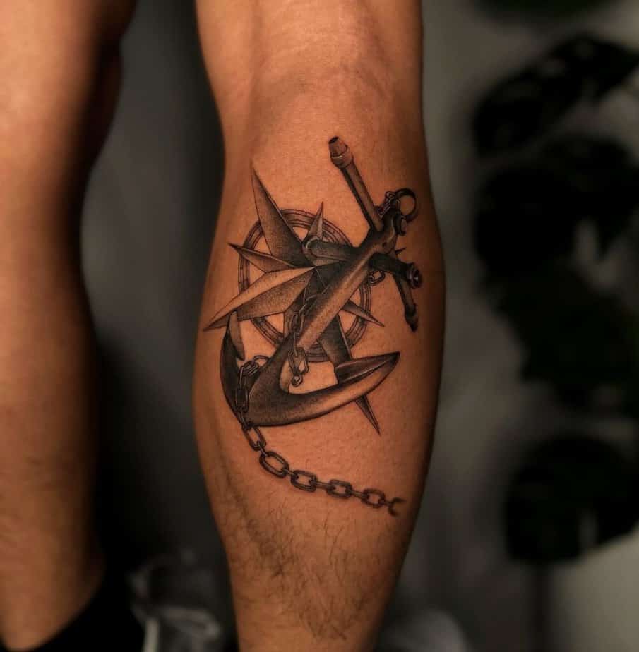 1. Compass and anchor tattoo on the calf