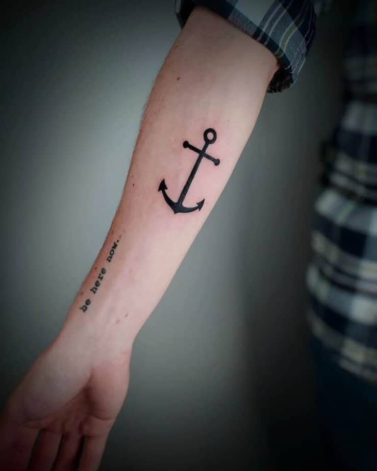 10. Simplistic black ink anchor on the forearm