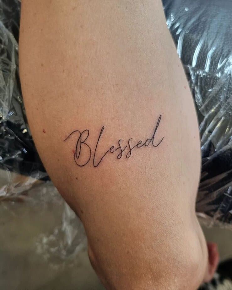 Minimalistic blessed tattoo