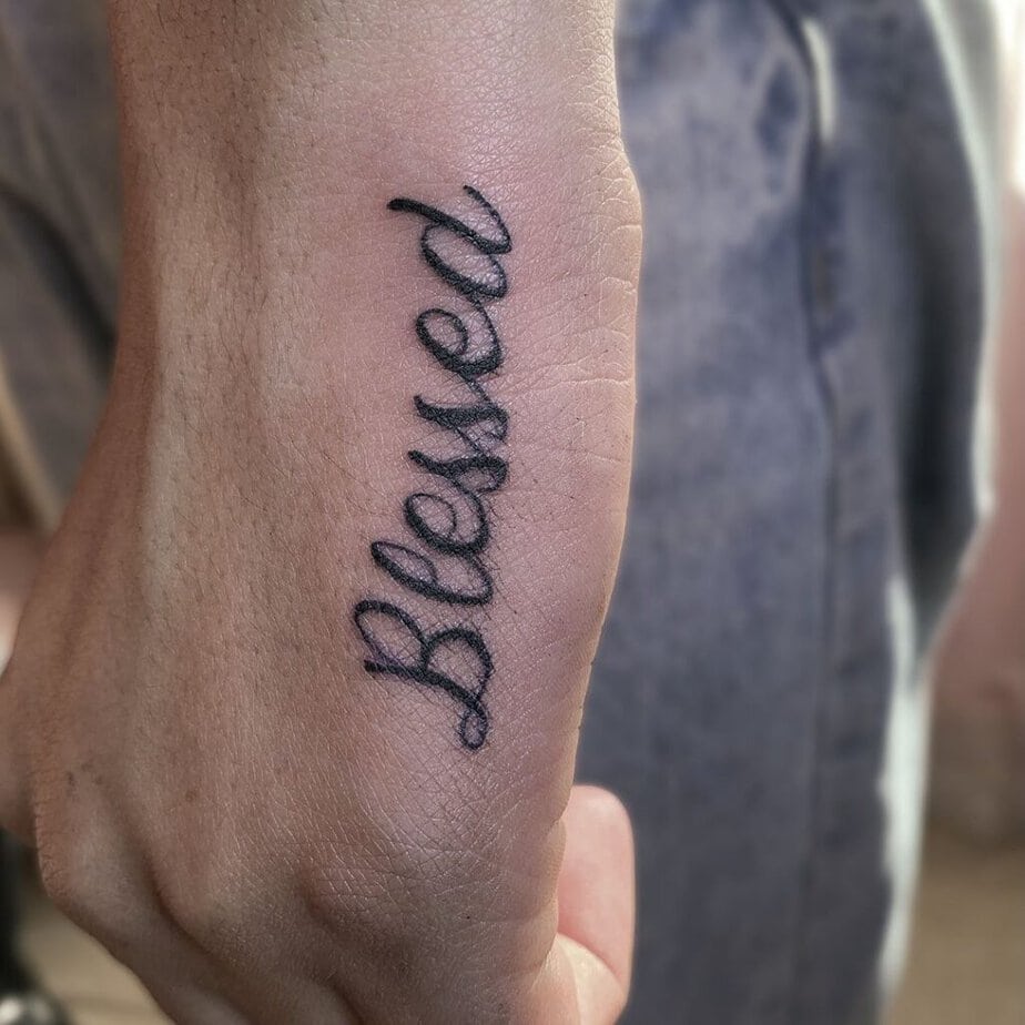 Blessed tattoo on the hand 