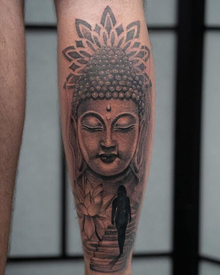 18. A Buddha tattoo on the back of the leg