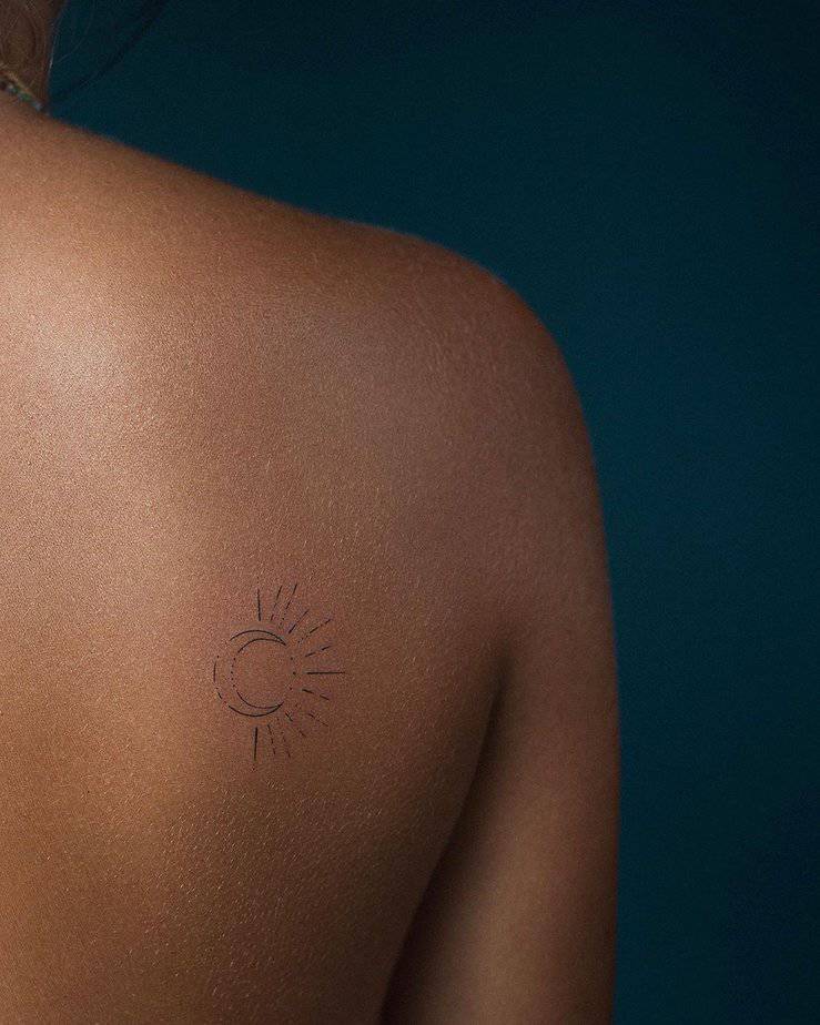 21. A sun and moon tattoo
