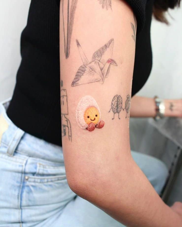 9. A sticker sleeve egg tattoo